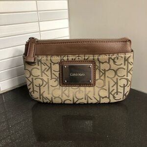 Calvin Klein monogram canvas and brown faux leather wristlet